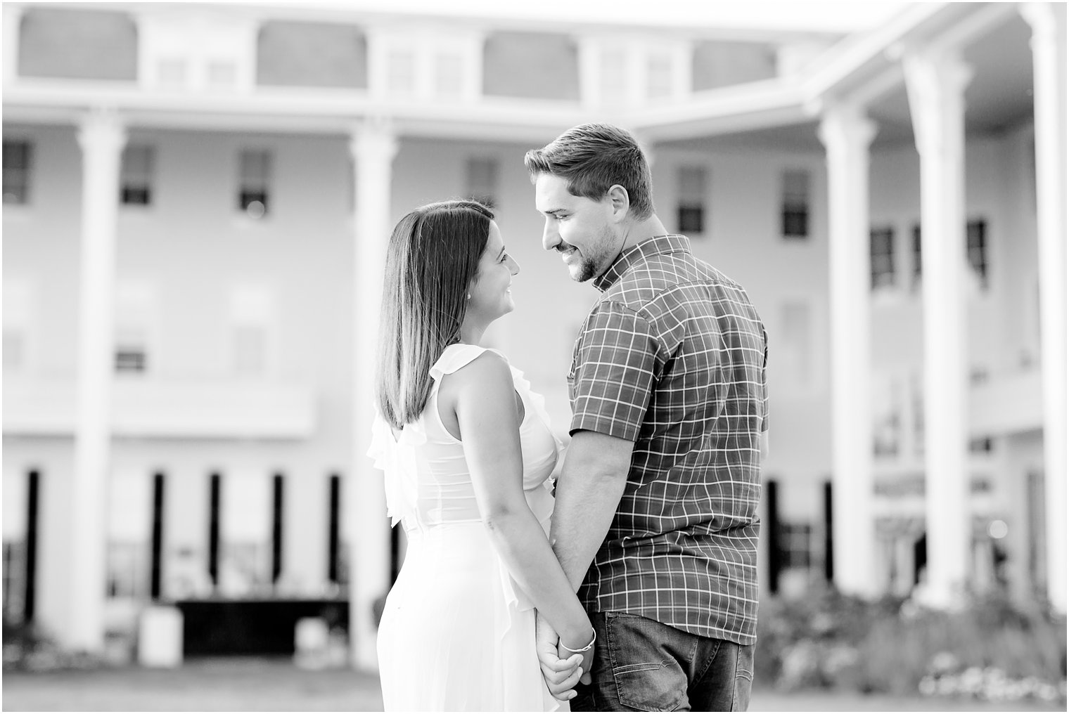 Black and white engagement photo at Congress Hall
