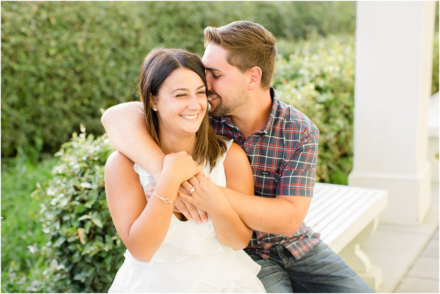 Candid engagement photo by Idalia Photography