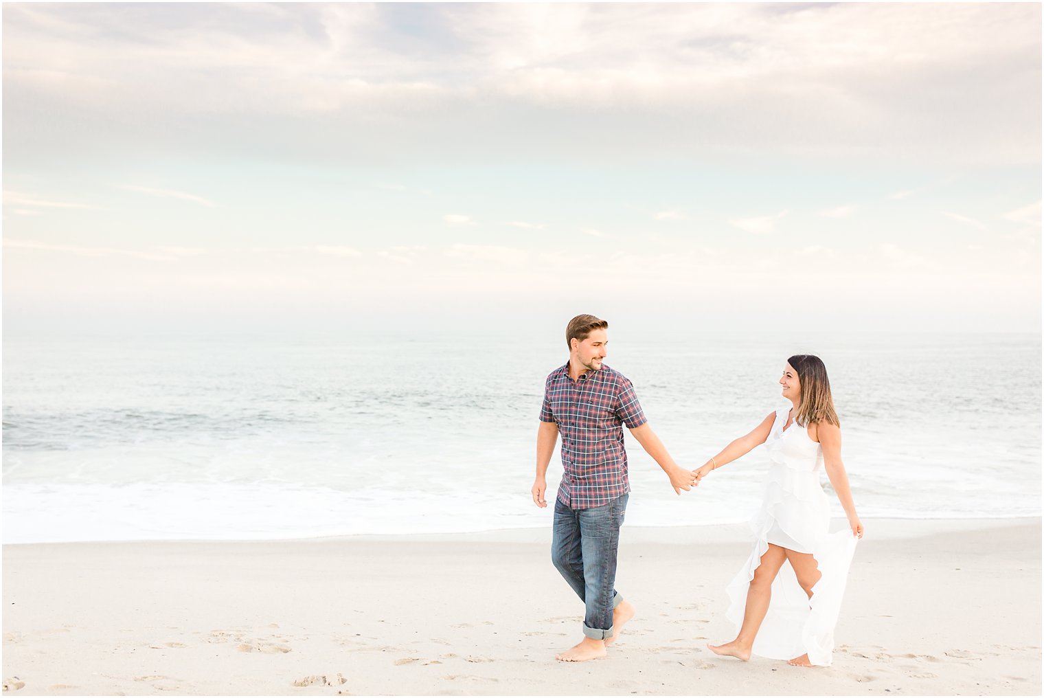 Couple walking at the beach in Cape May