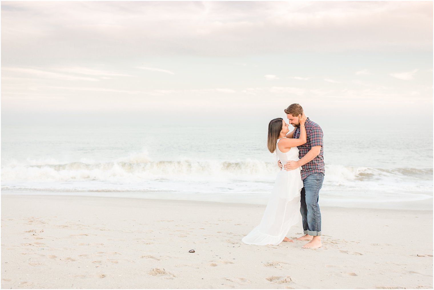 Couple kissing on the beach