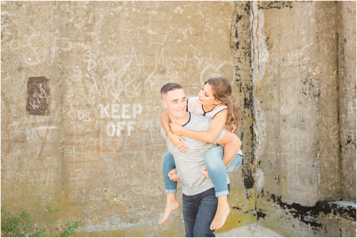 Piggy back ride during engagement photos | Photos by Idalia Photography