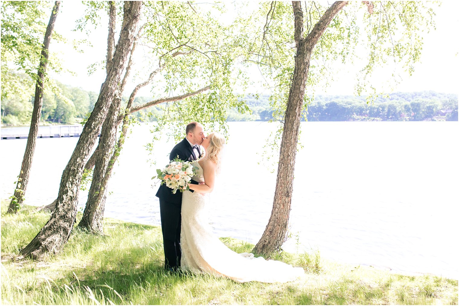 Bride and groom portraits by the lake | Photos by Indian Trail Club Wedding Photographer Idalia Photography