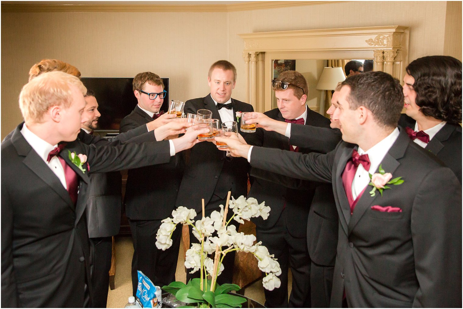 Groomsmen toasting with groom