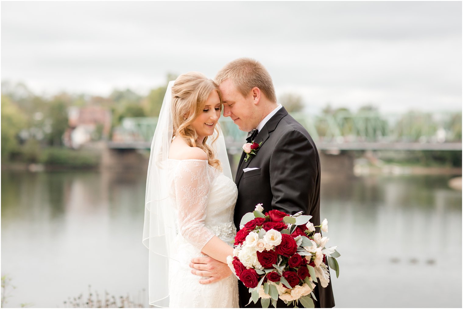 Bride and groom portraits with New Hope-Lambertville Bridge