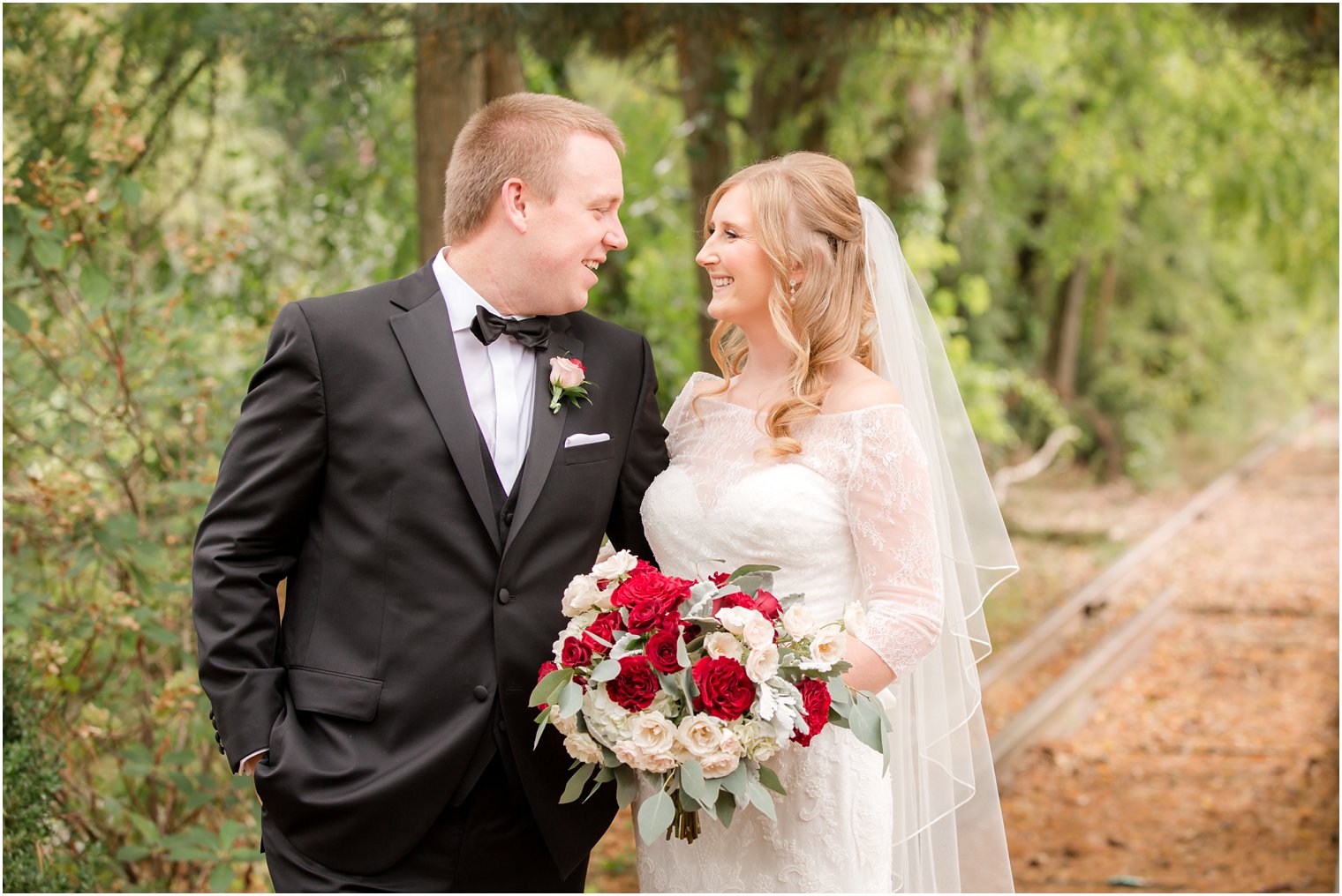 Wedding portrait of bride and groom during their fall wedding