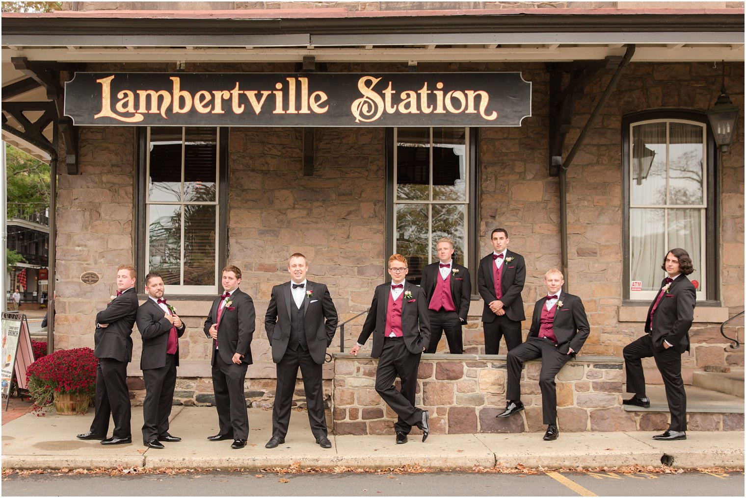 Groomsmen tuxedos with burgundy vest