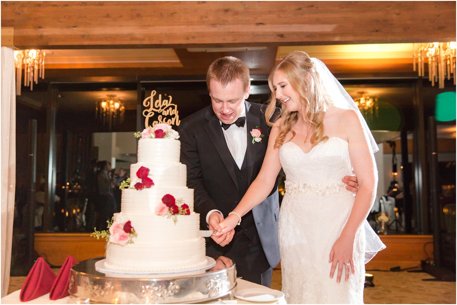 Bride and groom cutting cake during their Lambertville Station Inn Wedding