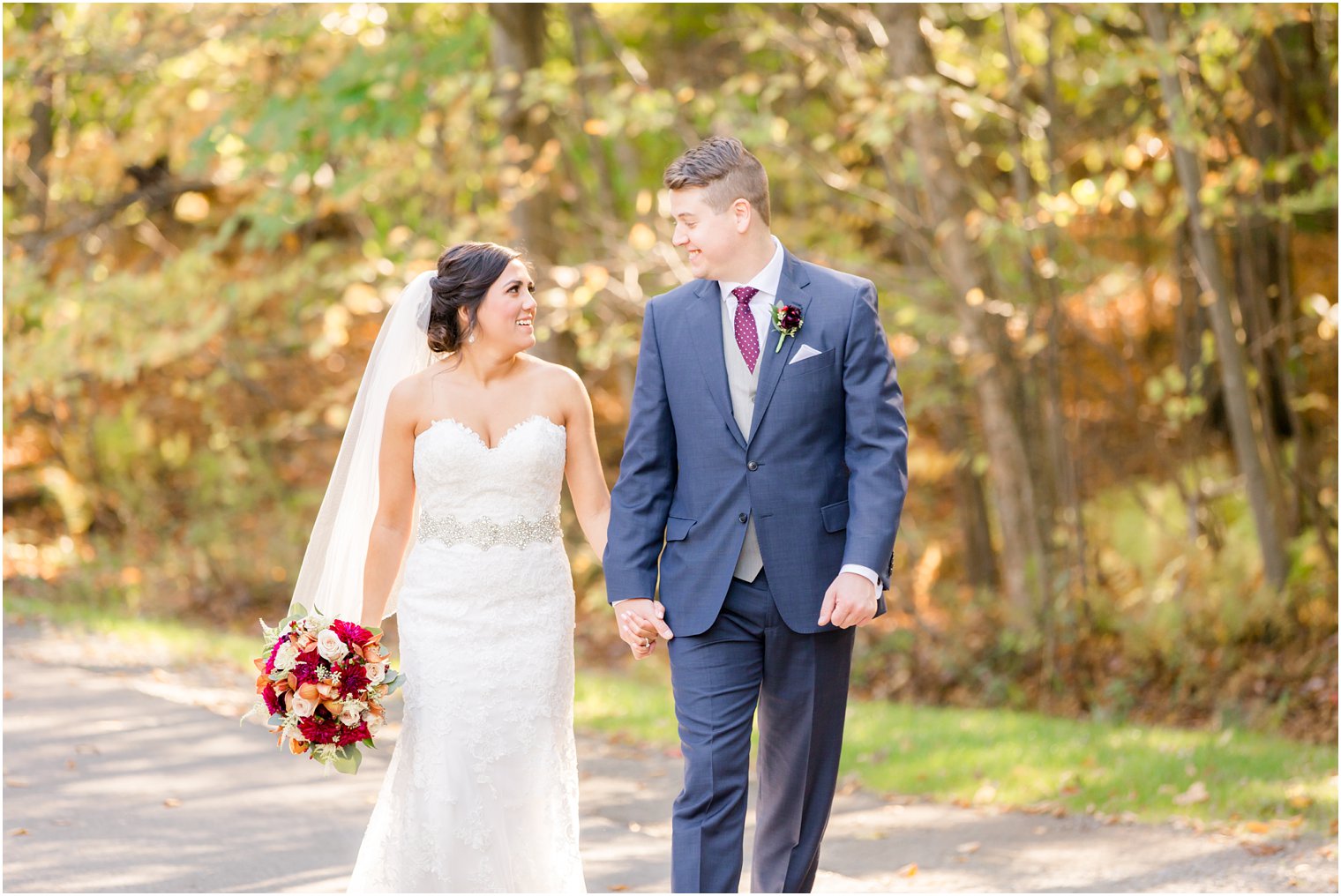 Candid wedding photo of bride and groom | Photos by NJ Wedding Photographers Idalia Photography