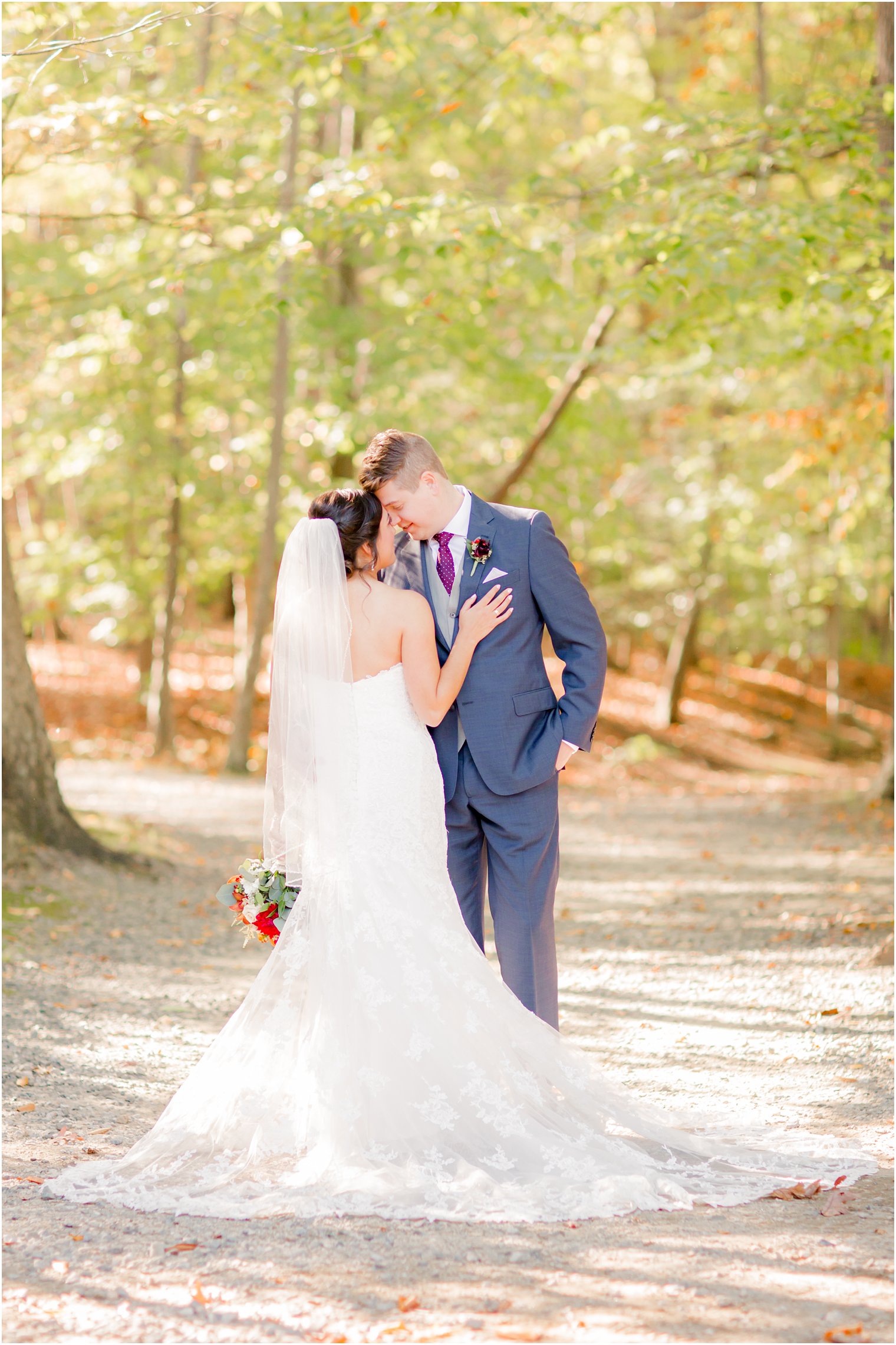 Bride wearing Essense of Australia dress | Photos by NJ Wedding Photographers Idalia Photography