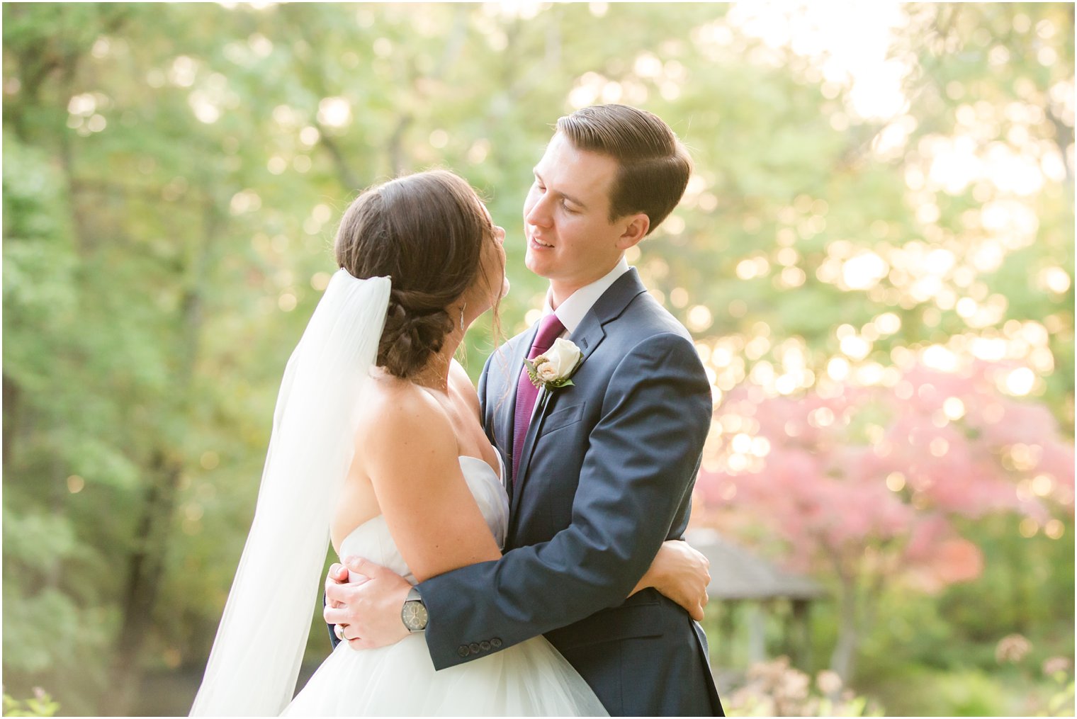 Groom looking into his bride's eyes