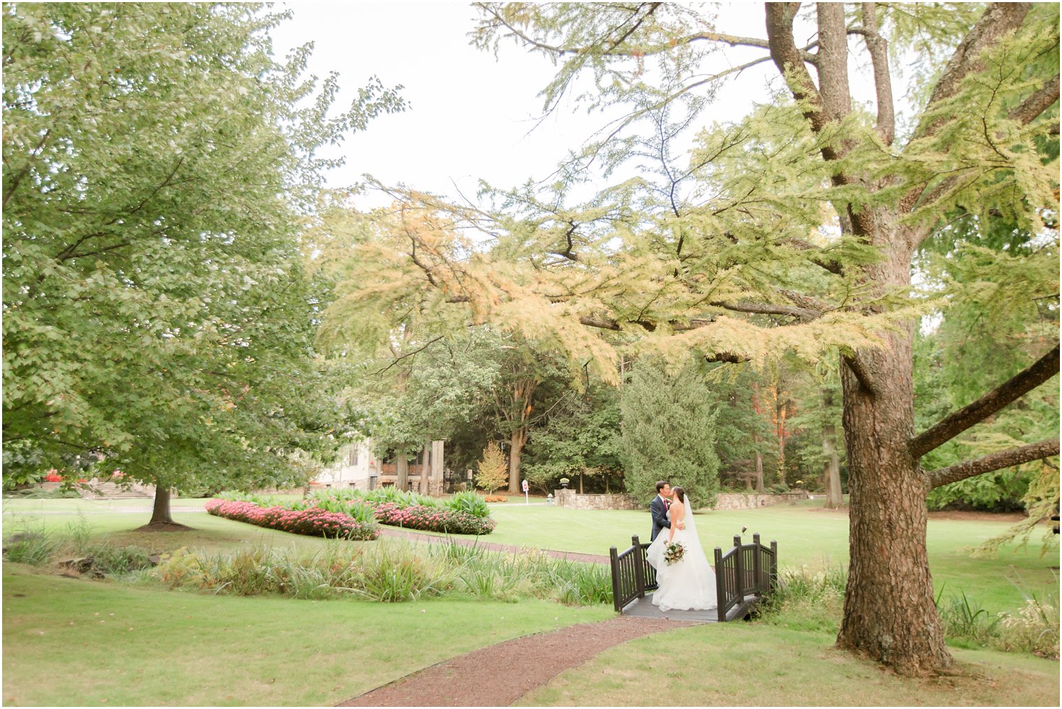 Wedding photos in wooded area of Pleasantdale Chateau