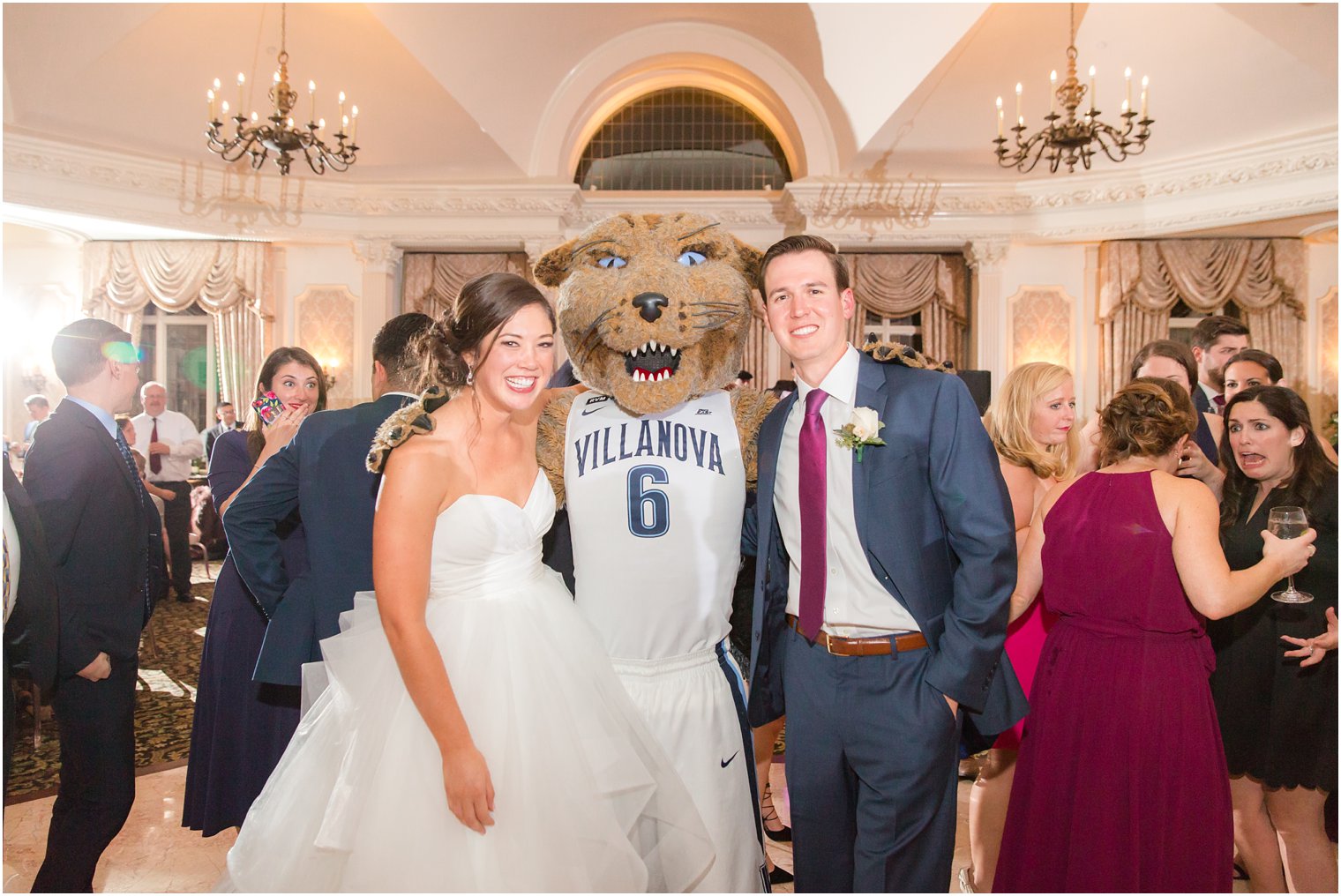 Bride and groom with Villanova Wildcat