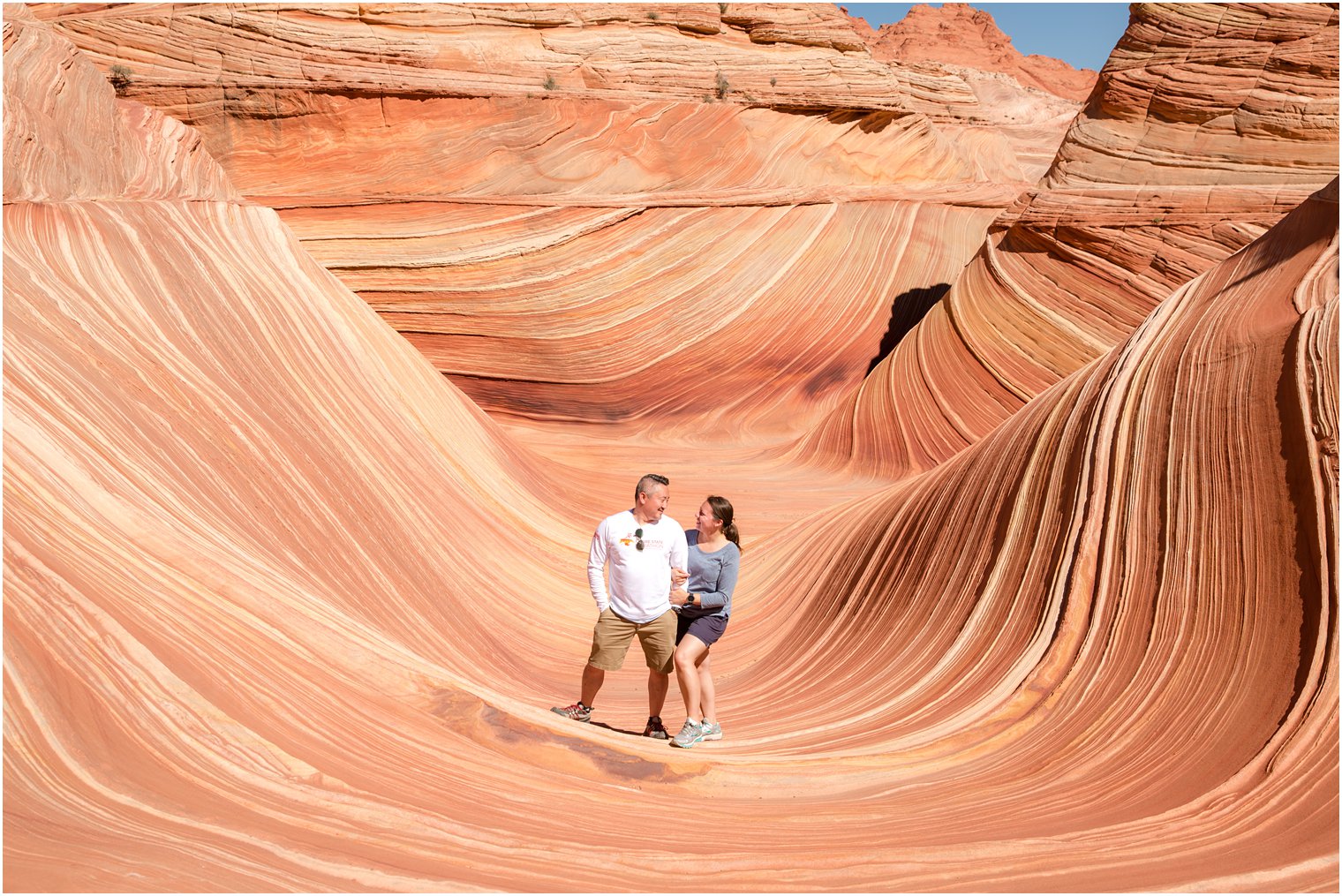 Photo of couple at The Wave, Coyote Buttes