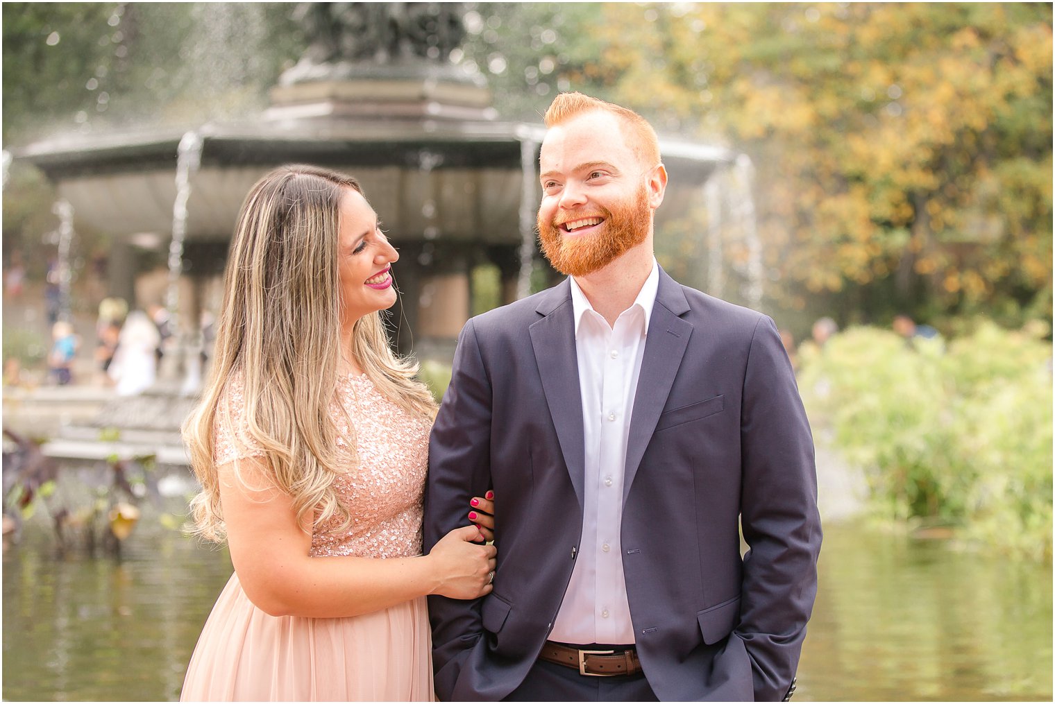 Smiling bride and groom at Bethesda Terrace