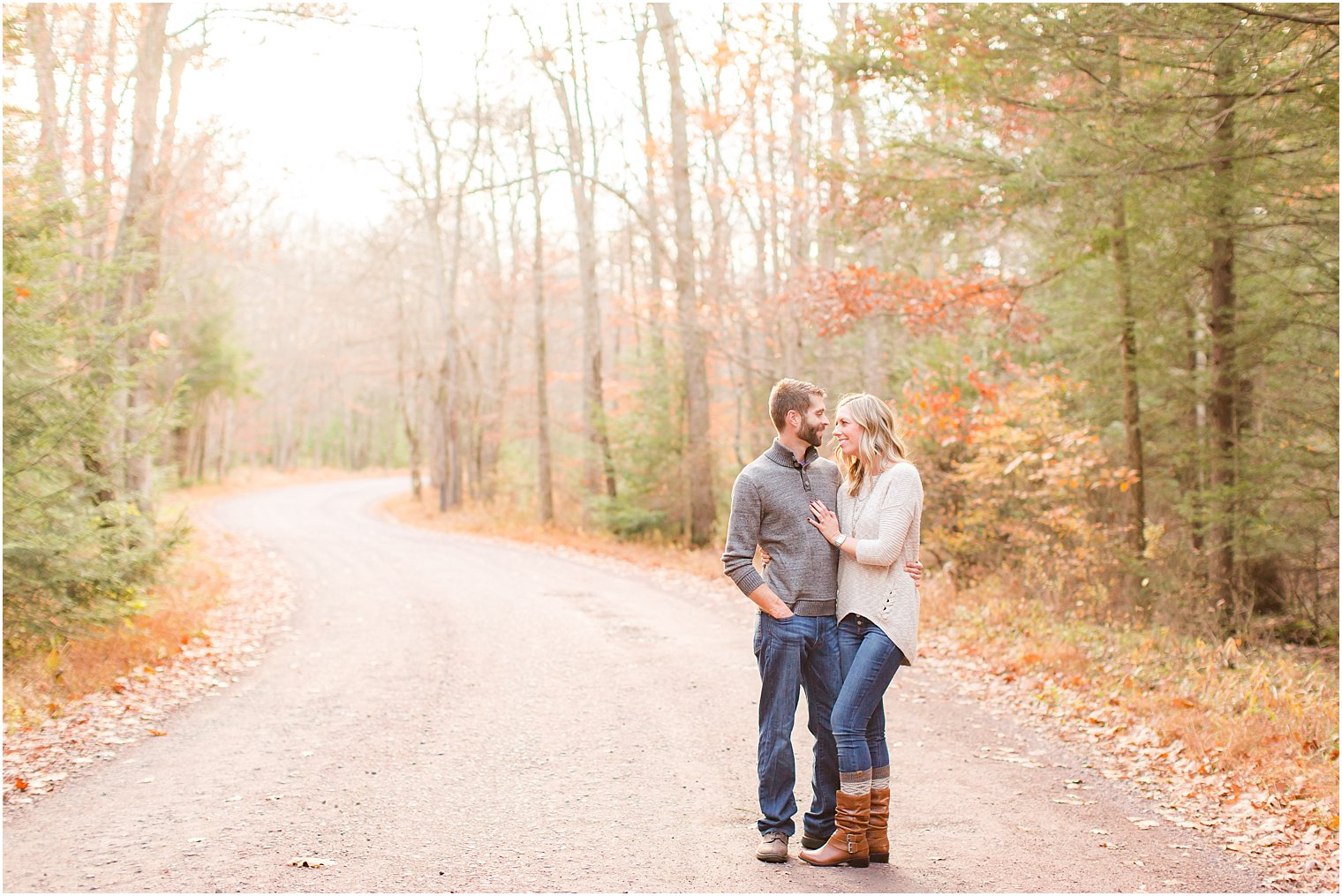 Romantic engagement photos with fall foliage