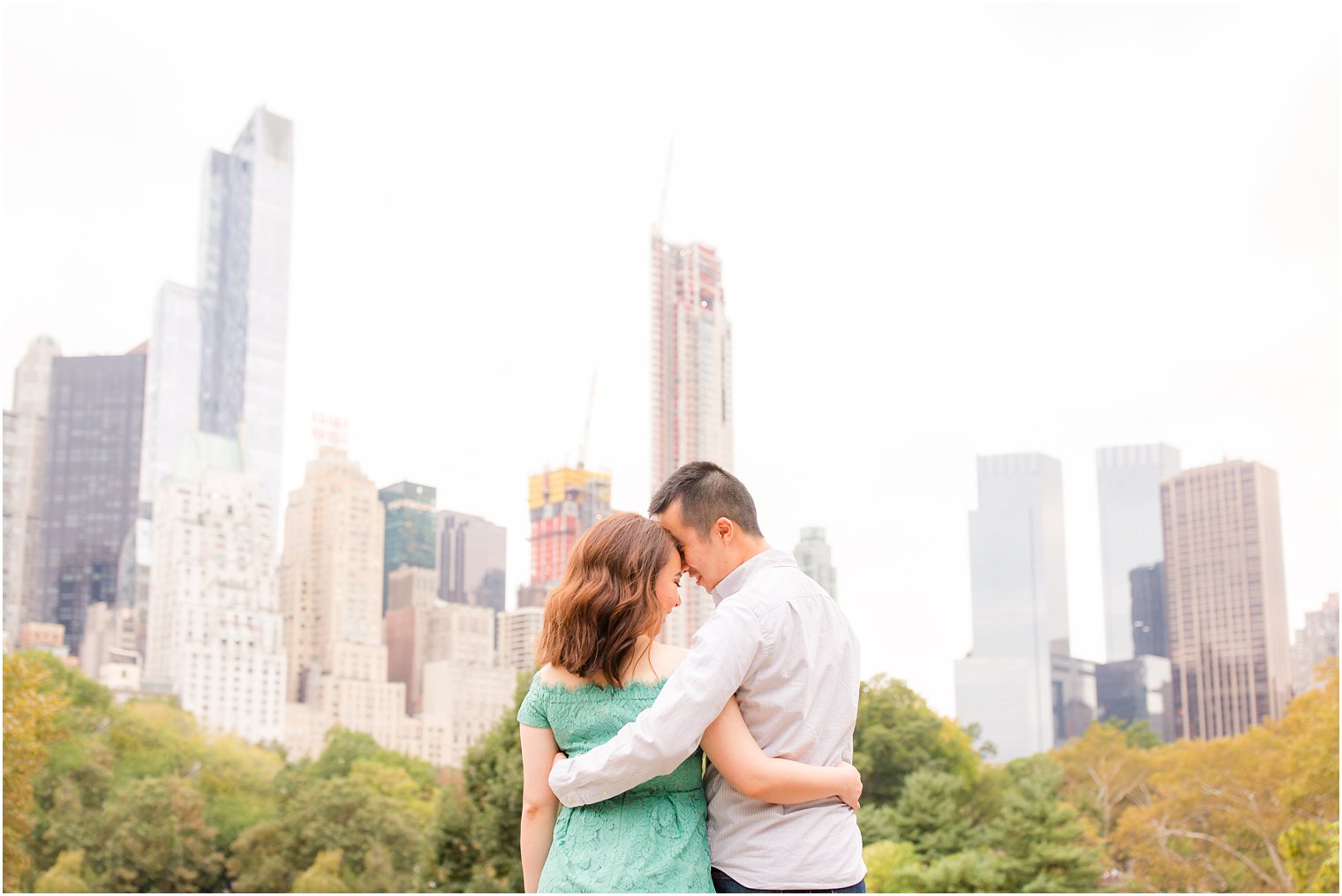 Engagement photo with NYC skyline