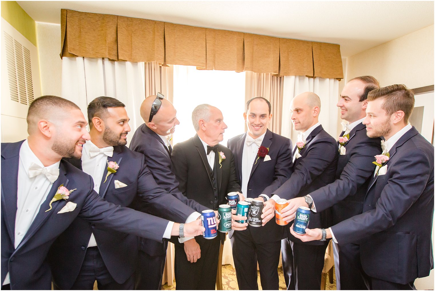 Groom toasting with groomsmen