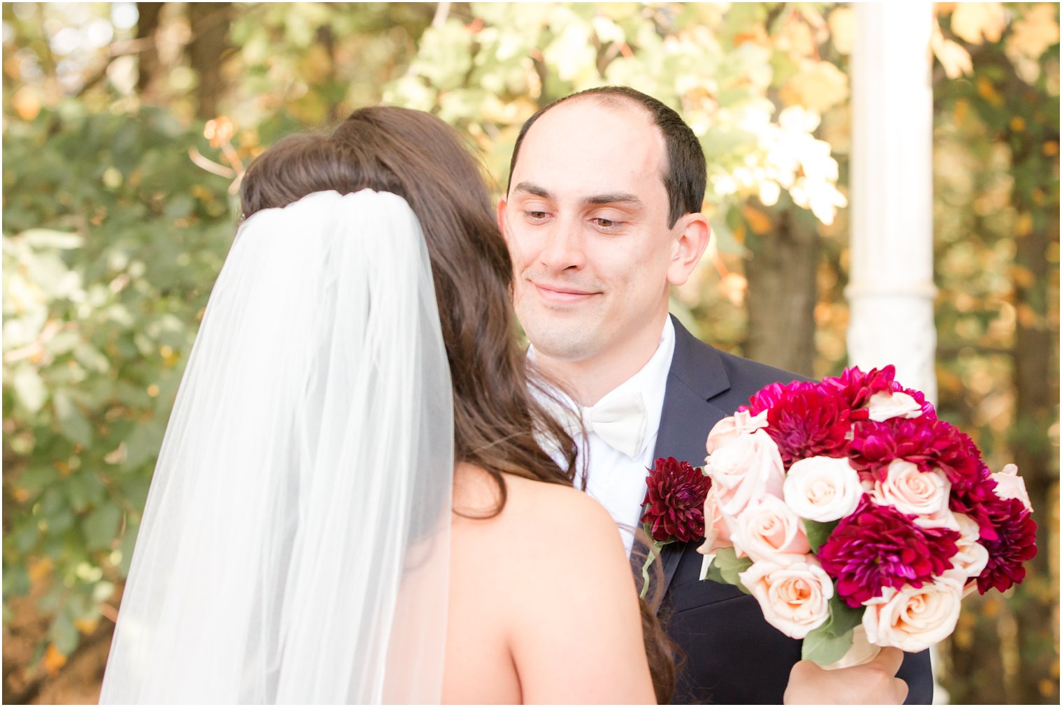 Groom looking at his bride at Nicotra's Ballroom Wedding