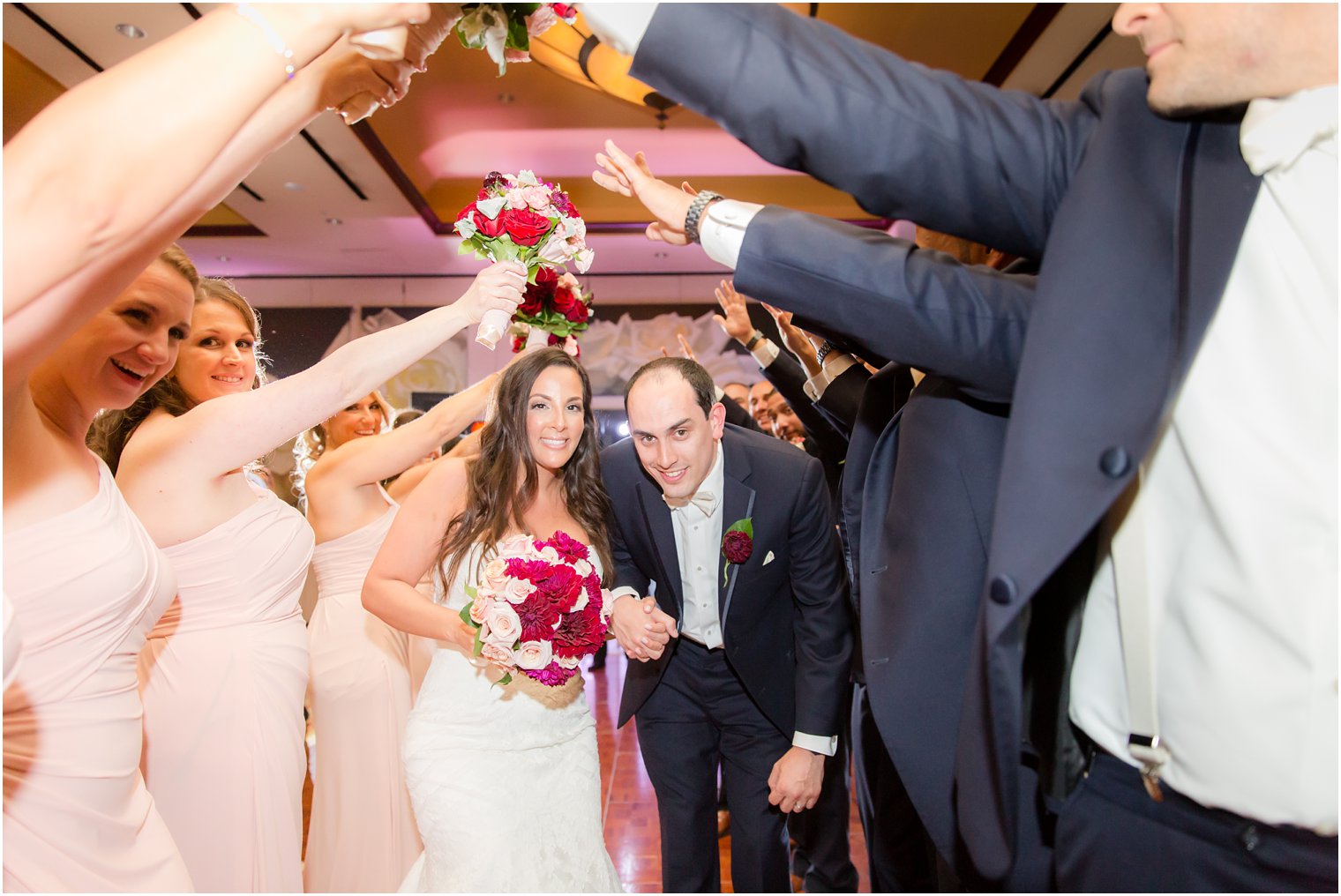 Nicotra's Ballroom Wedding Reception bride and groom under arch