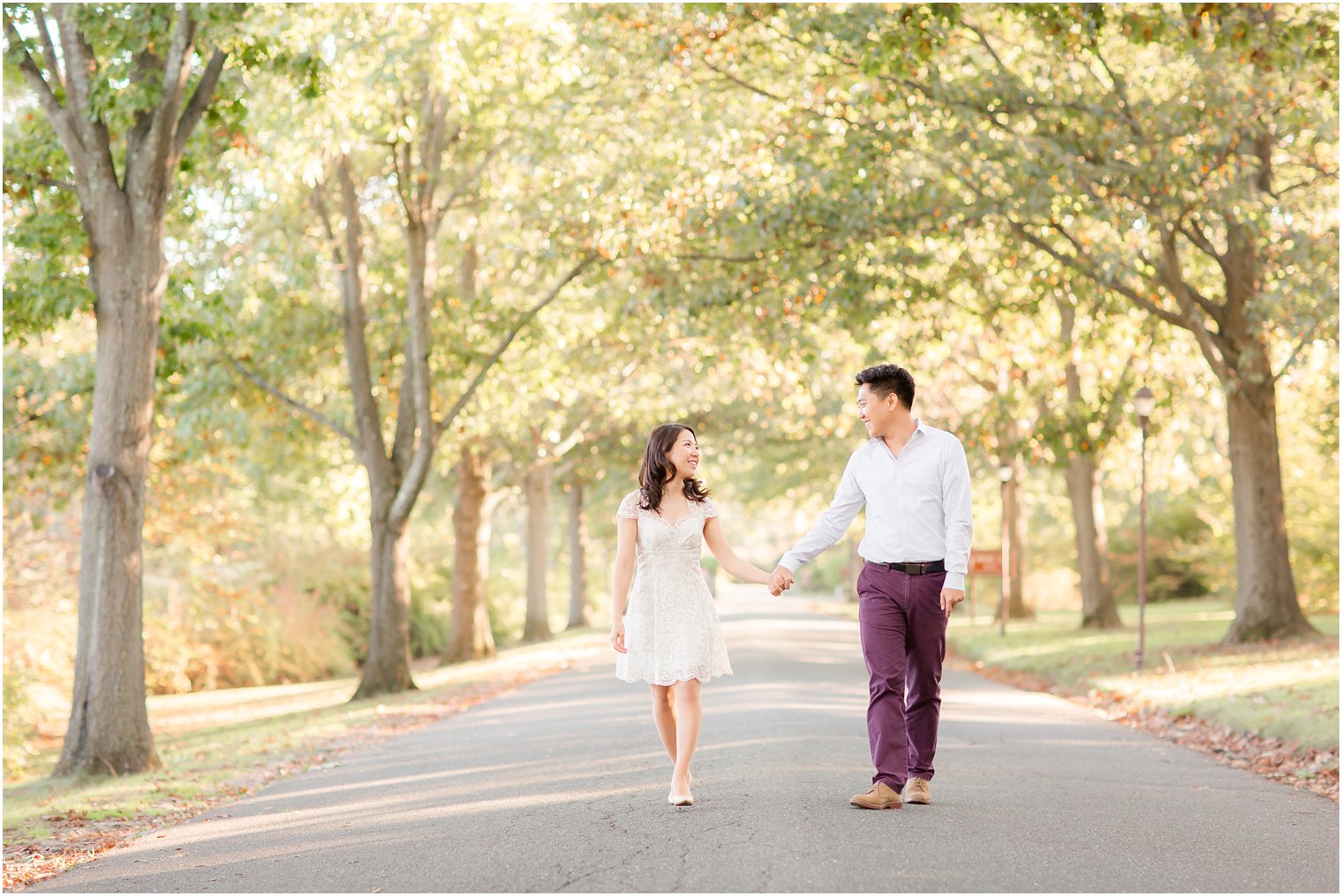 Couple walking during engagement session