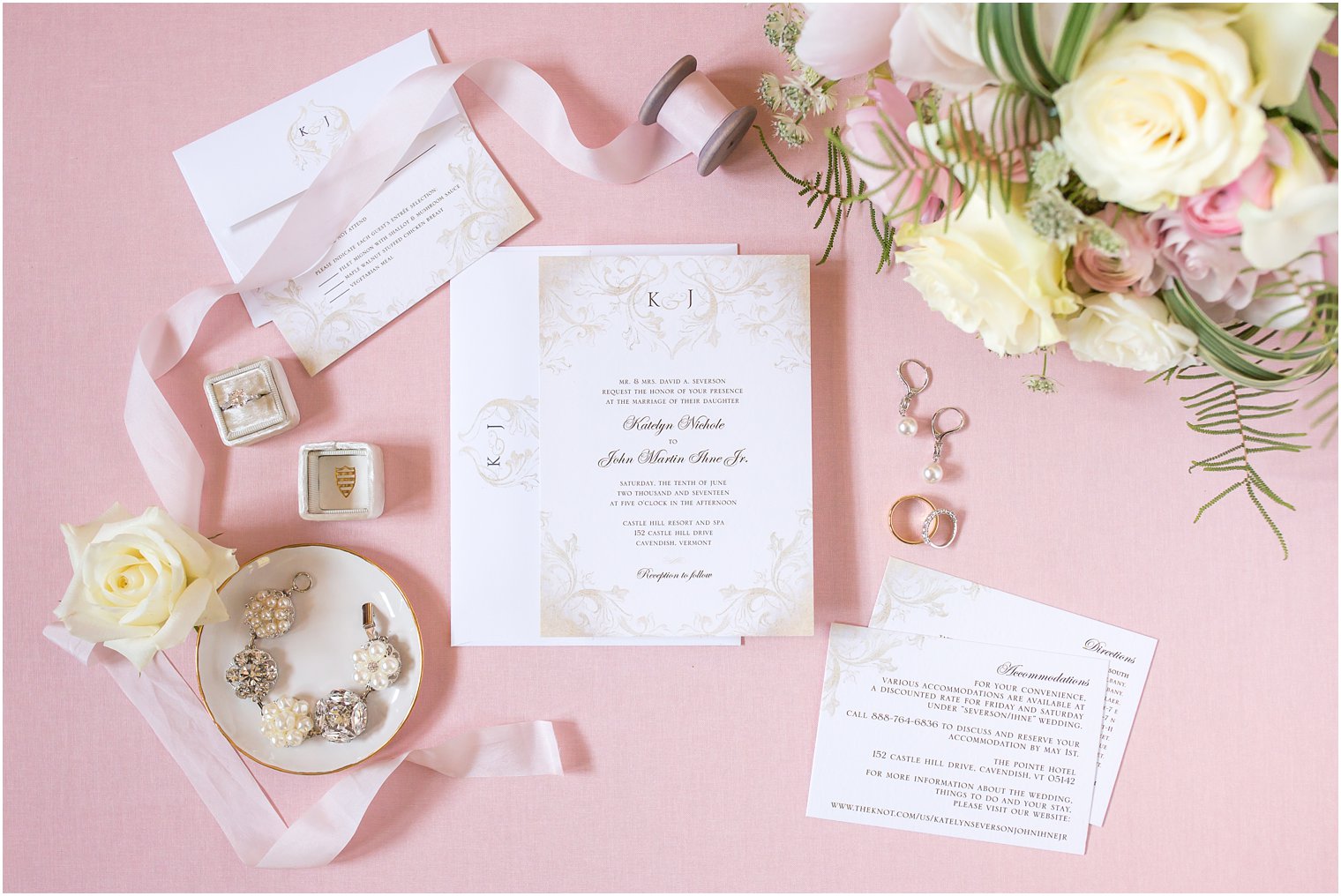 Photo of wedding invitation in gold and pink | Castle Hill Inn Resort in Ludlow, Vermont
