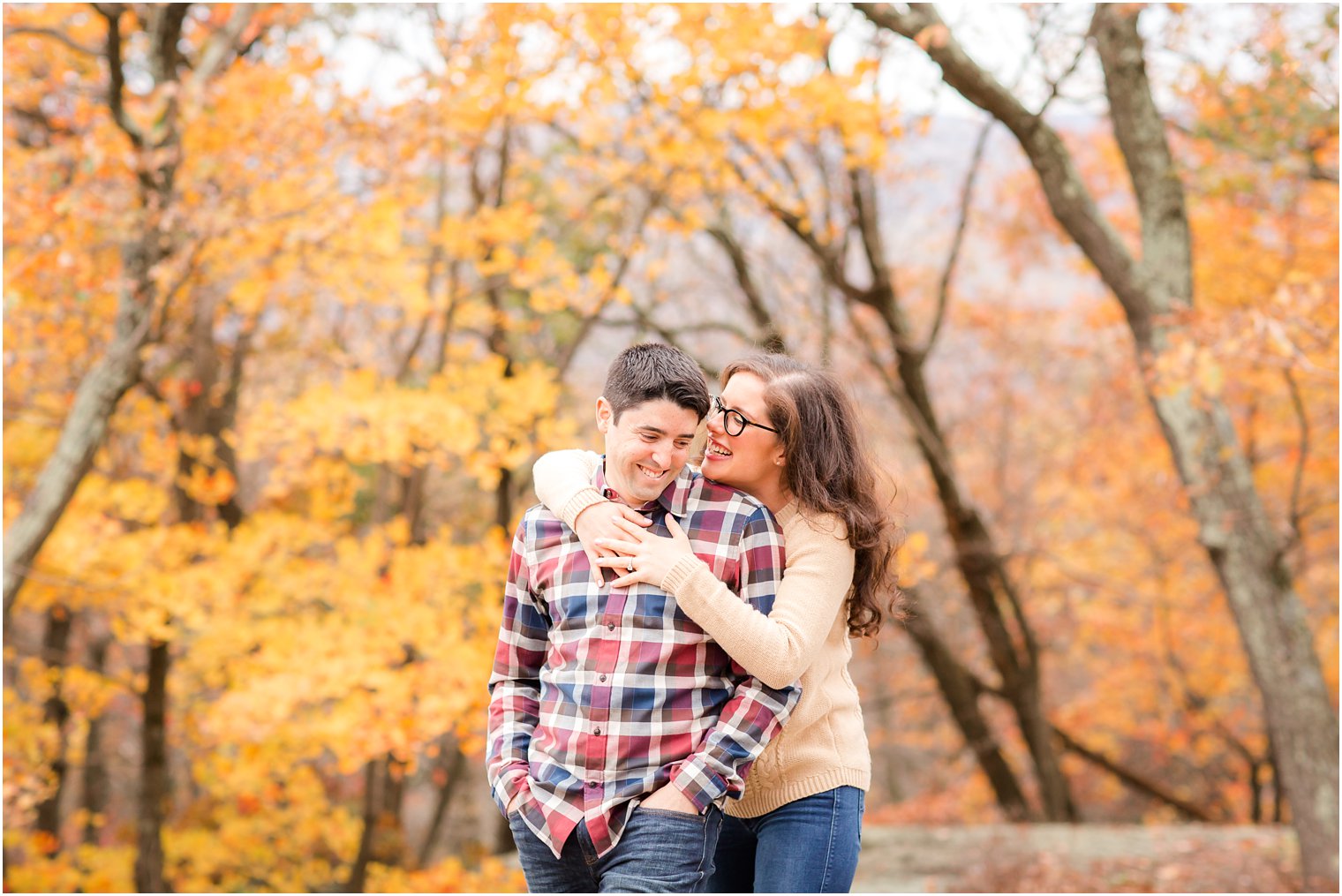 Engaged couple wearing fall colors | Idalia Photography