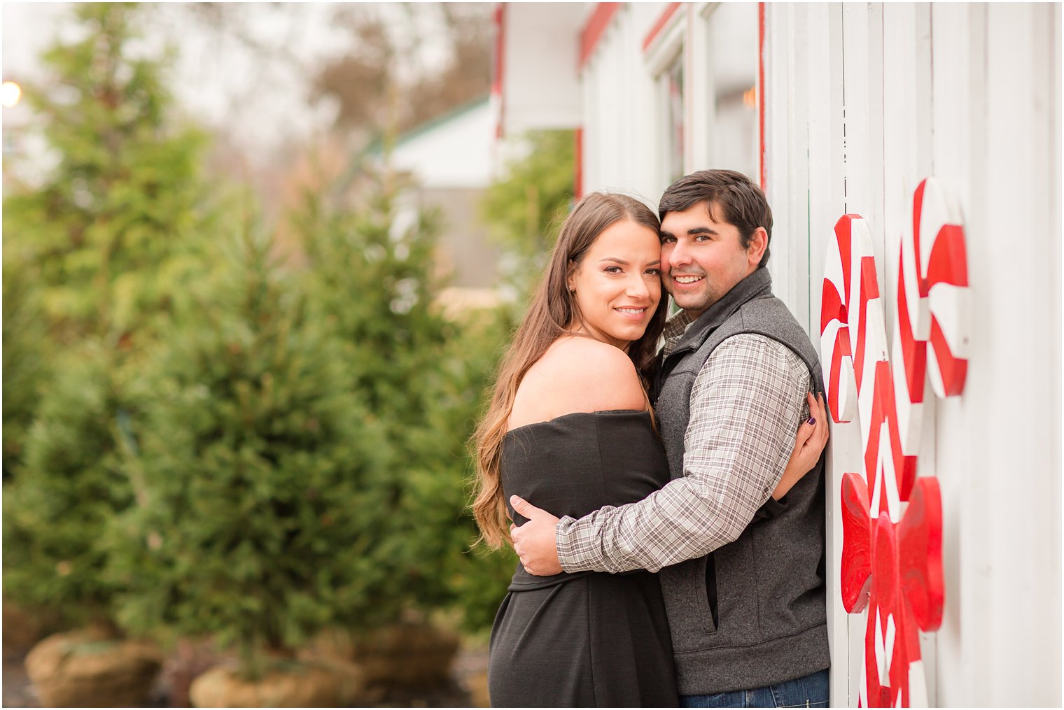 Christmas-themed engagement photo