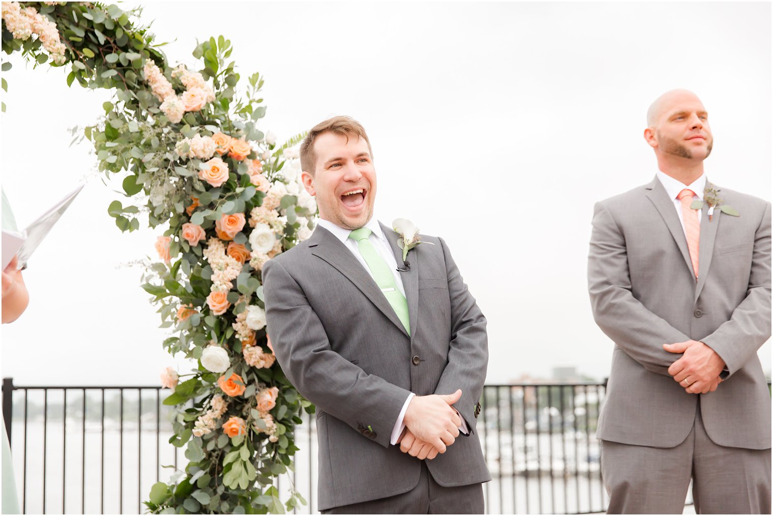 Groom's look of surprise after seeing his bride during outdoor ceremony