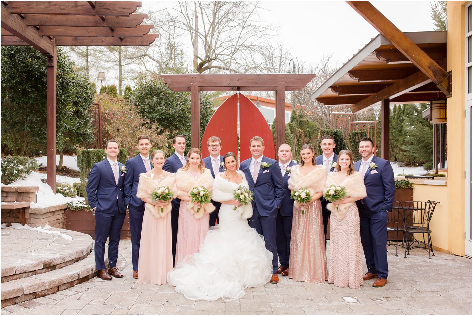 Bridal party during winter wedding at Stone House at Stirling Ridge in Warren, NJ