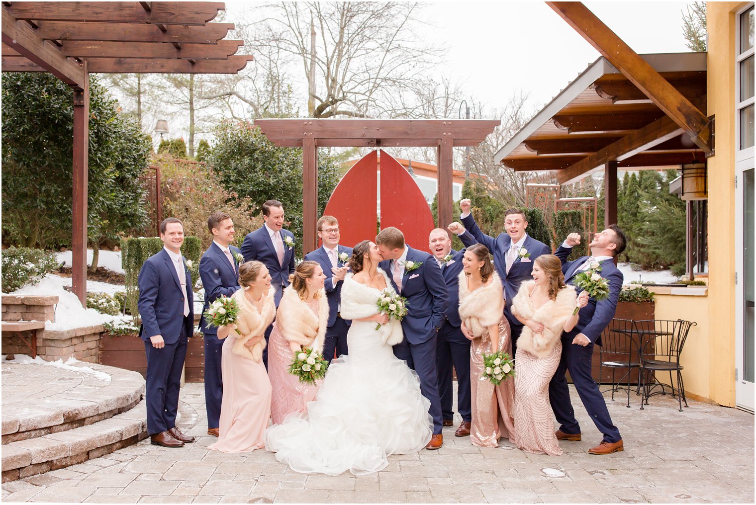 Joyful photo of bridal party at Stone House at Stirling Ridge in Warren, NJ