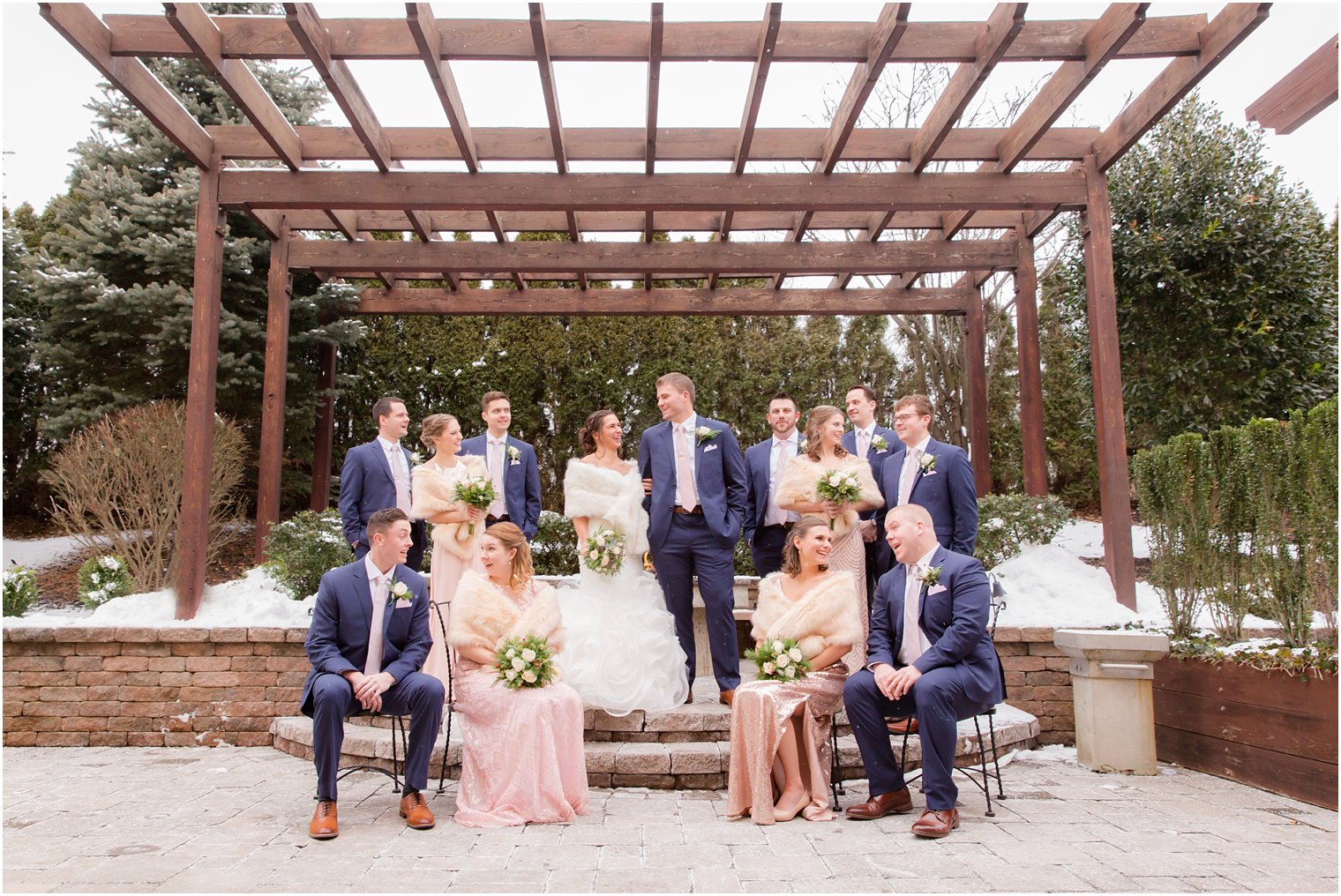 Formal portrait of bridal party wearing rose gold and navy | Stone House at Stirling Ridge in Warren, NJ