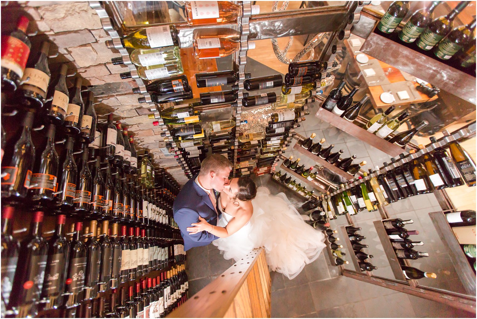 Romantic wedding photo of bride in groom at wine cellar of Stone House at Stirling Ridge