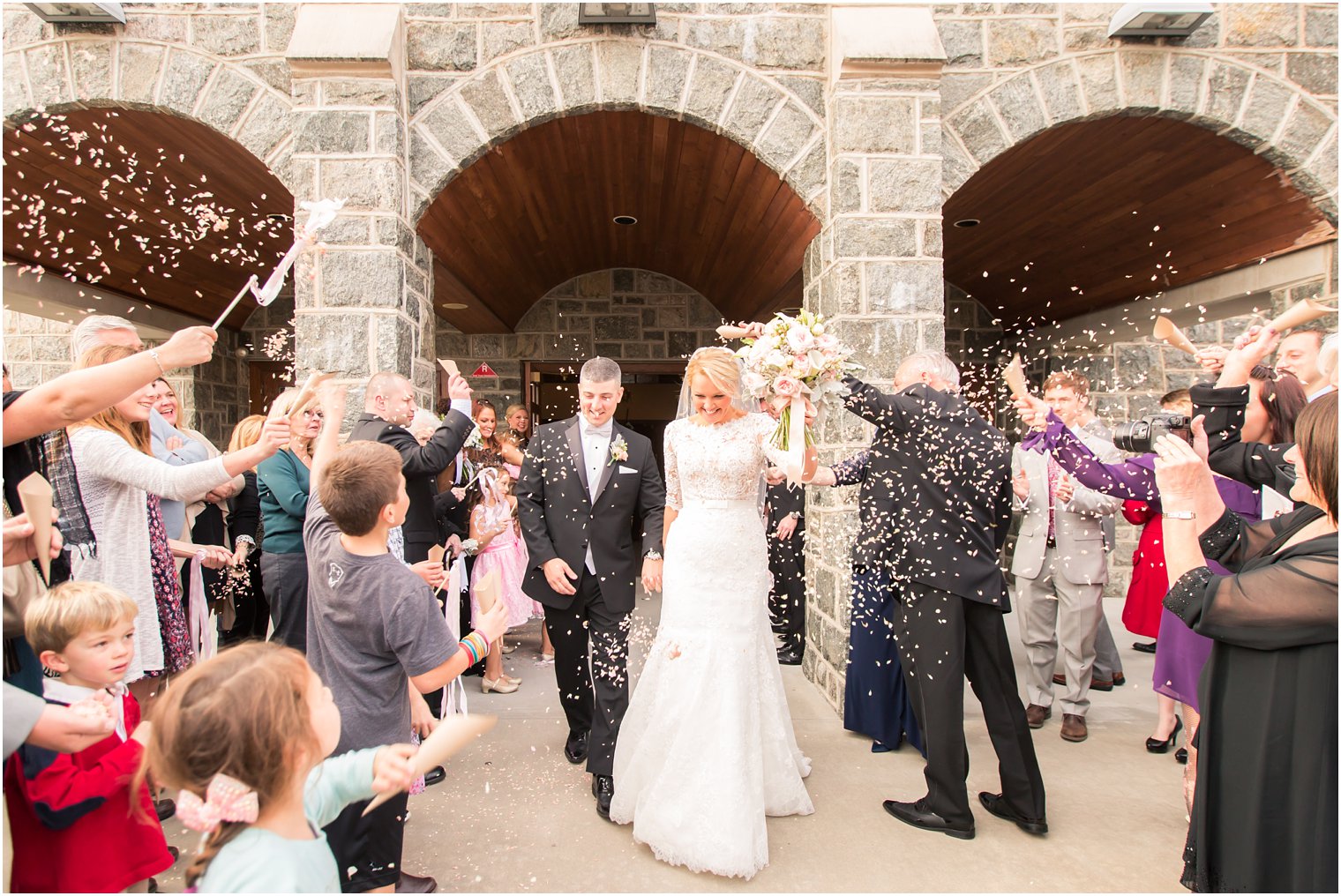 Winter ceremony church exit at St. Denis in Manasquan, NJ