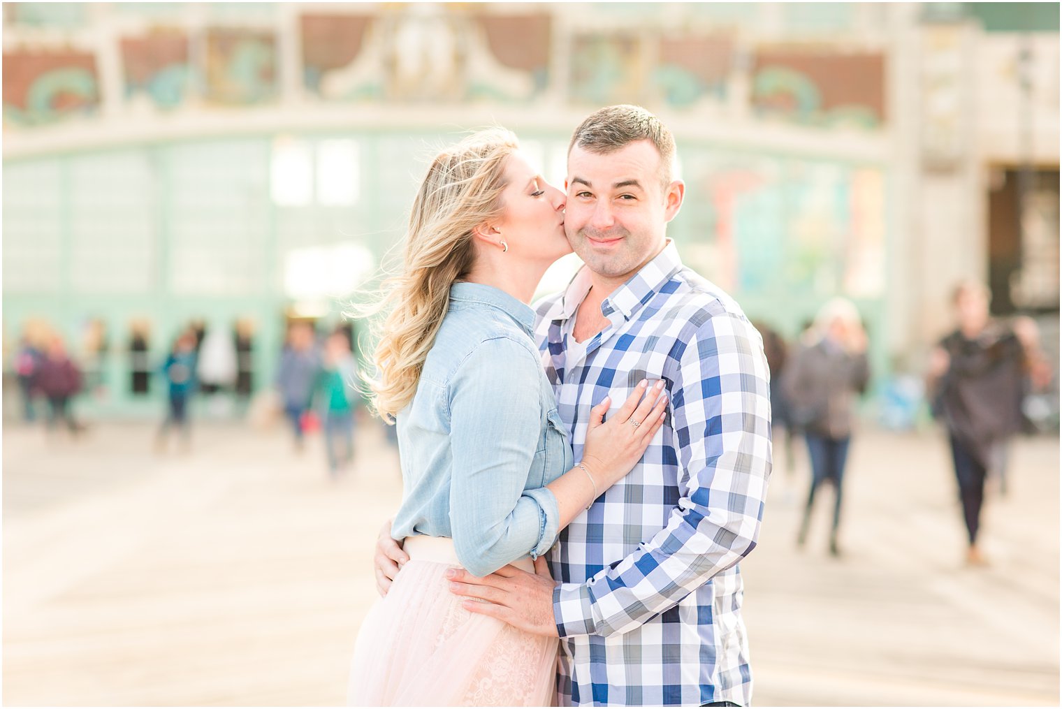 Funny engagement photo on the boardwalk in Asbury Park, NJ
