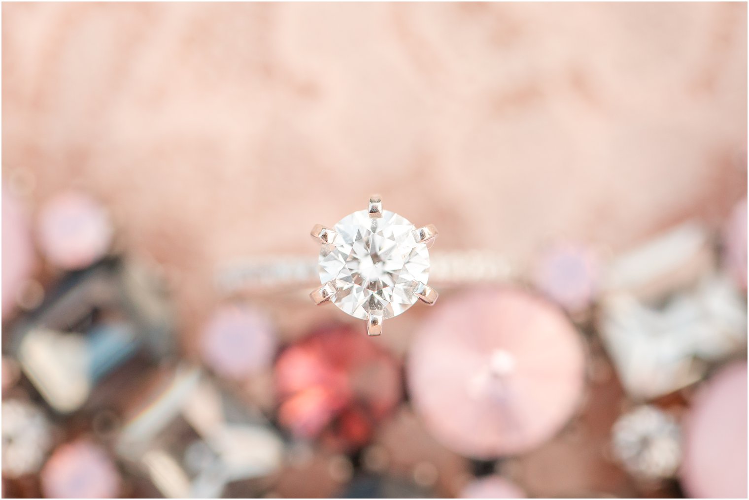 Engagement ring photo on pink tulle 