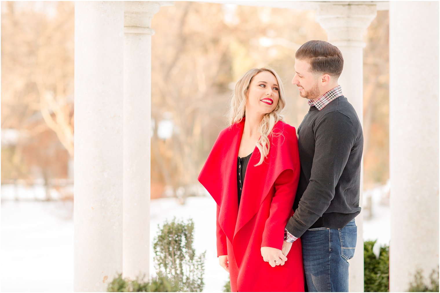 Bride wearing a red coat