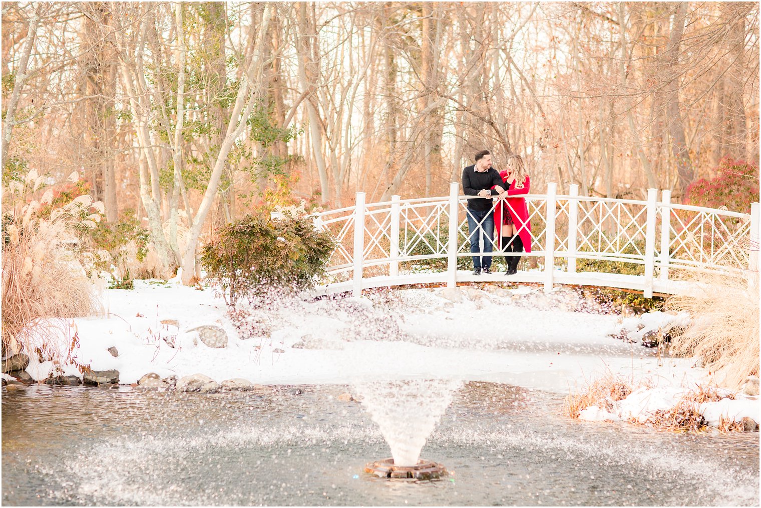 Couple on a white bride during engagement session