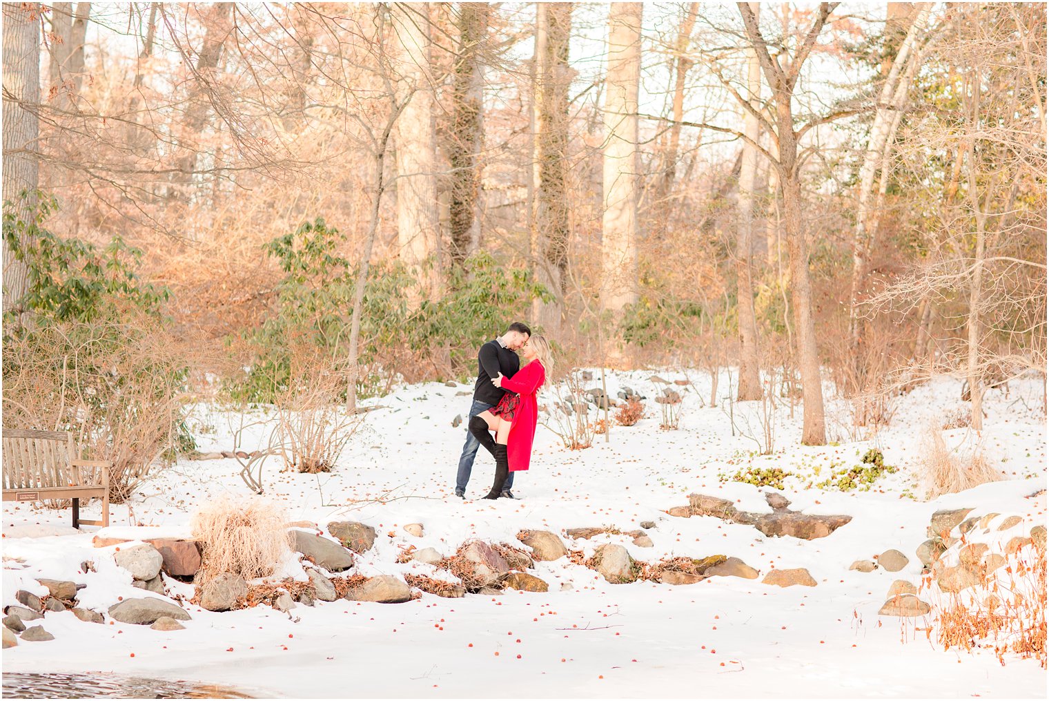 Romantic dip photo of engaged couple