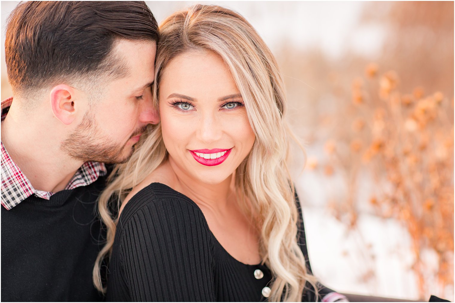 Blue-eyed bride with red lipstick