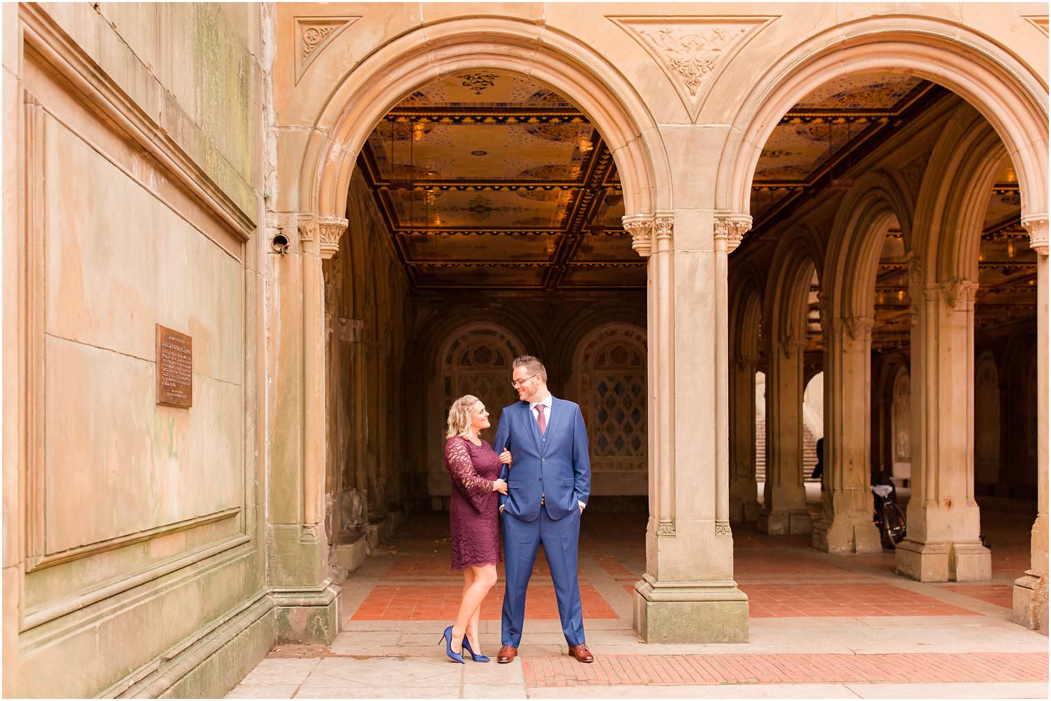 Engaged couple in Bethesda Terrace