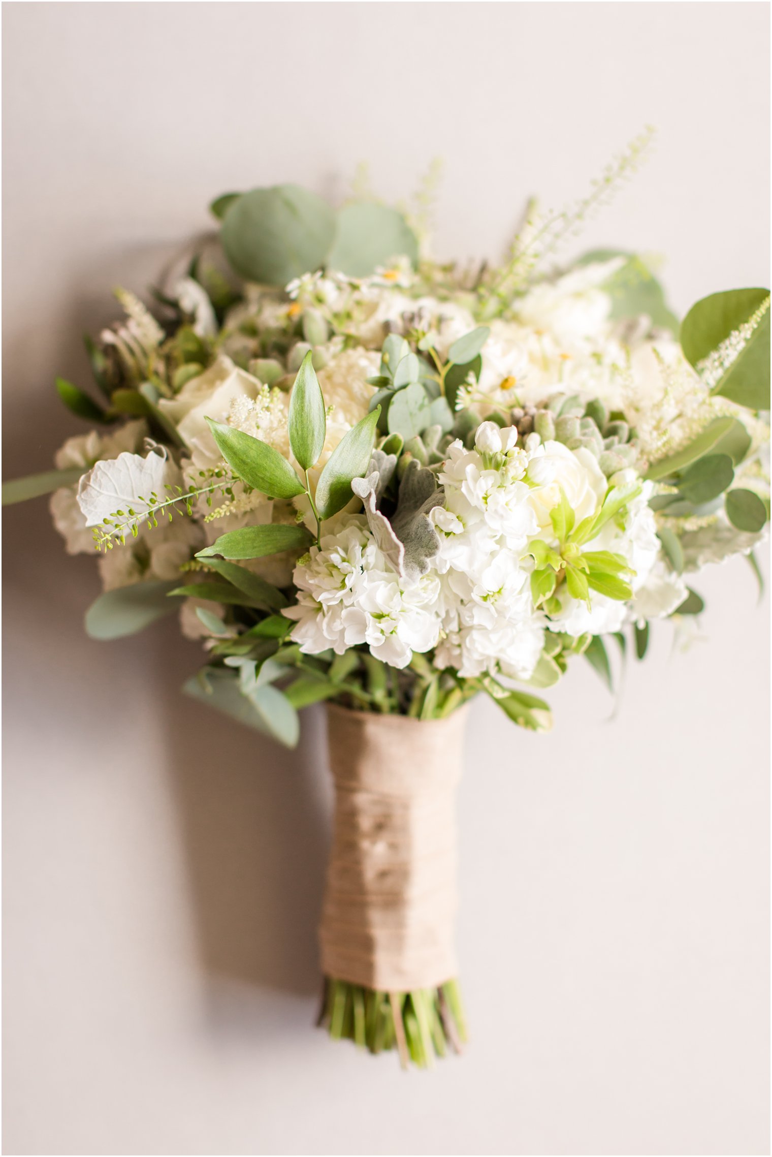 bridal bouquet with organic florals and burlap wrap