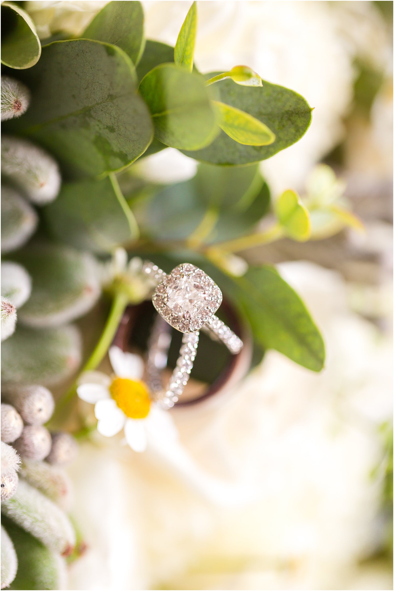 diamond ring in a bed of flowers