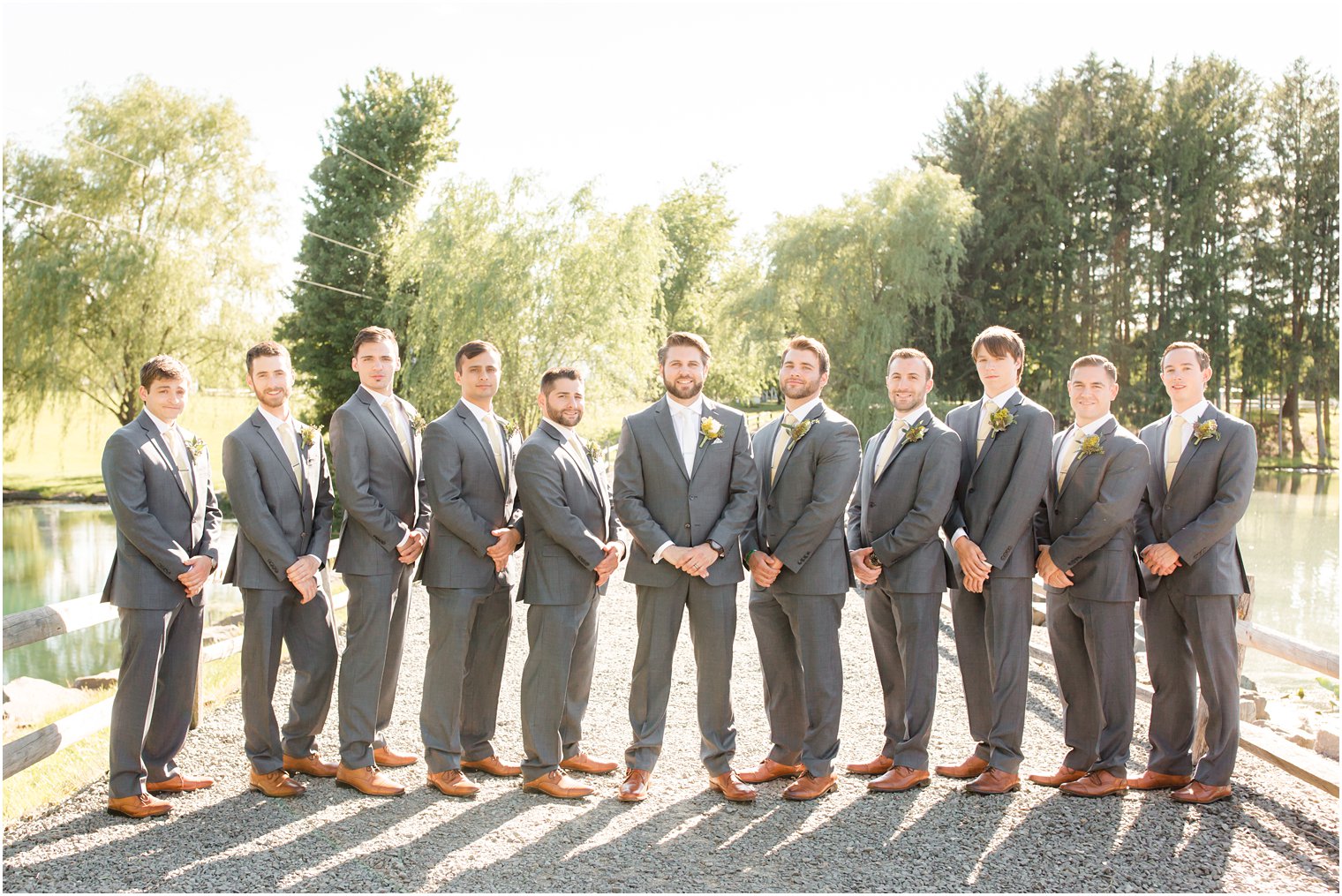 groomsmen wearing gray suits
