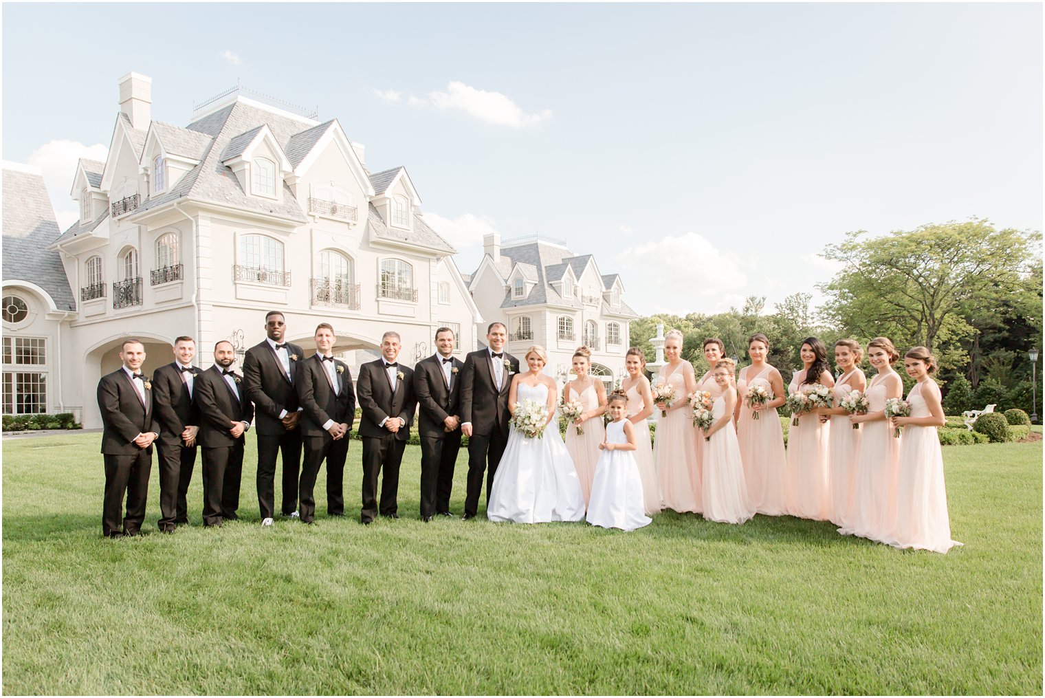 Bridal Party wearing peach and black color palette