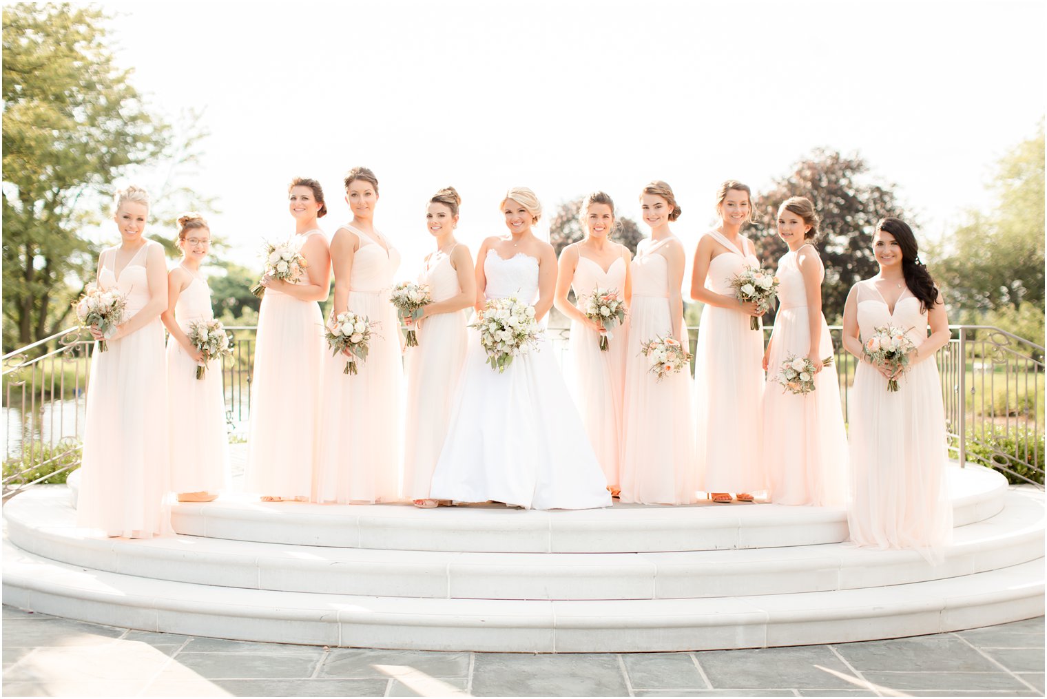 Bridesmaids in peach dresses