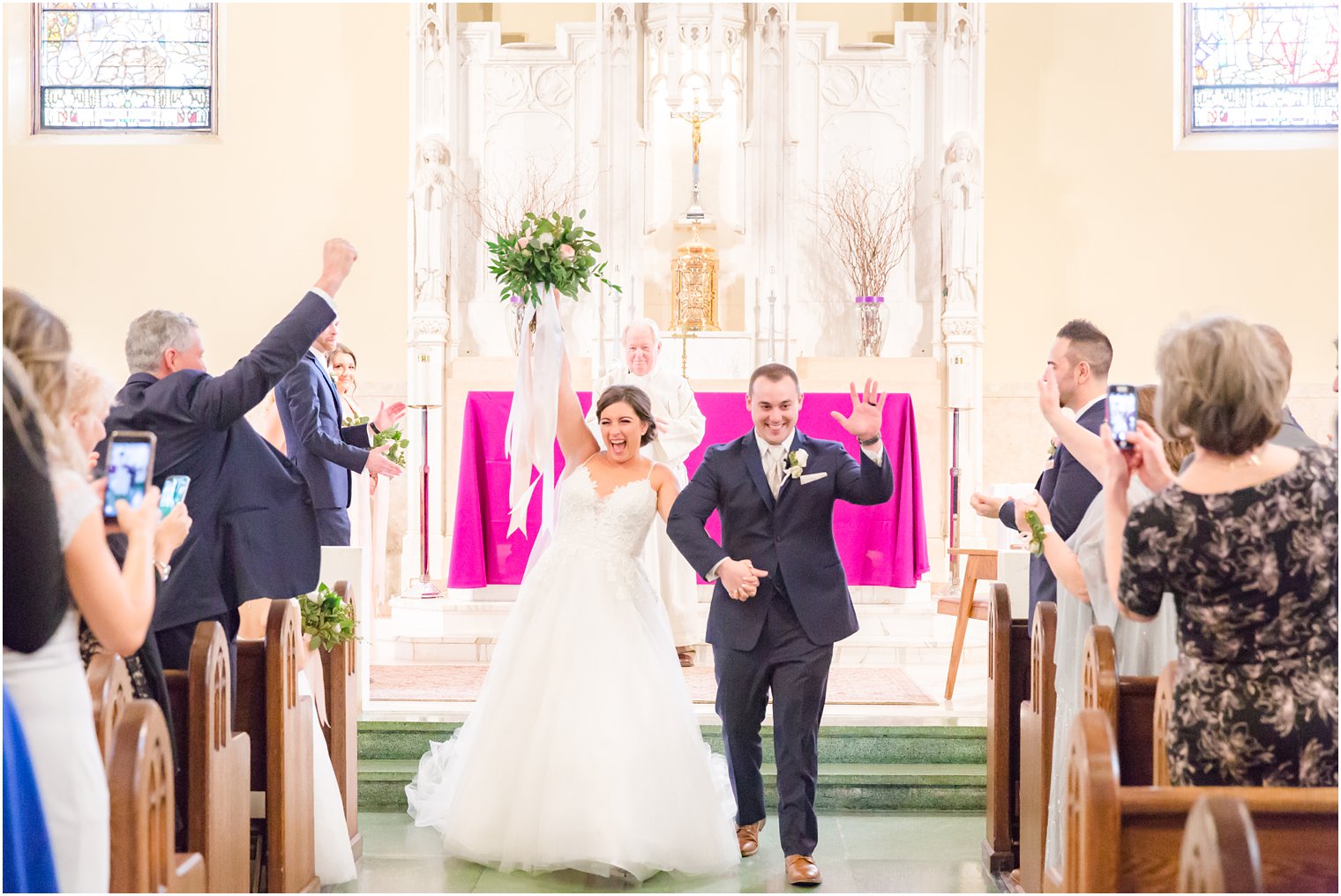 Bride and groom recessional at St. Rose