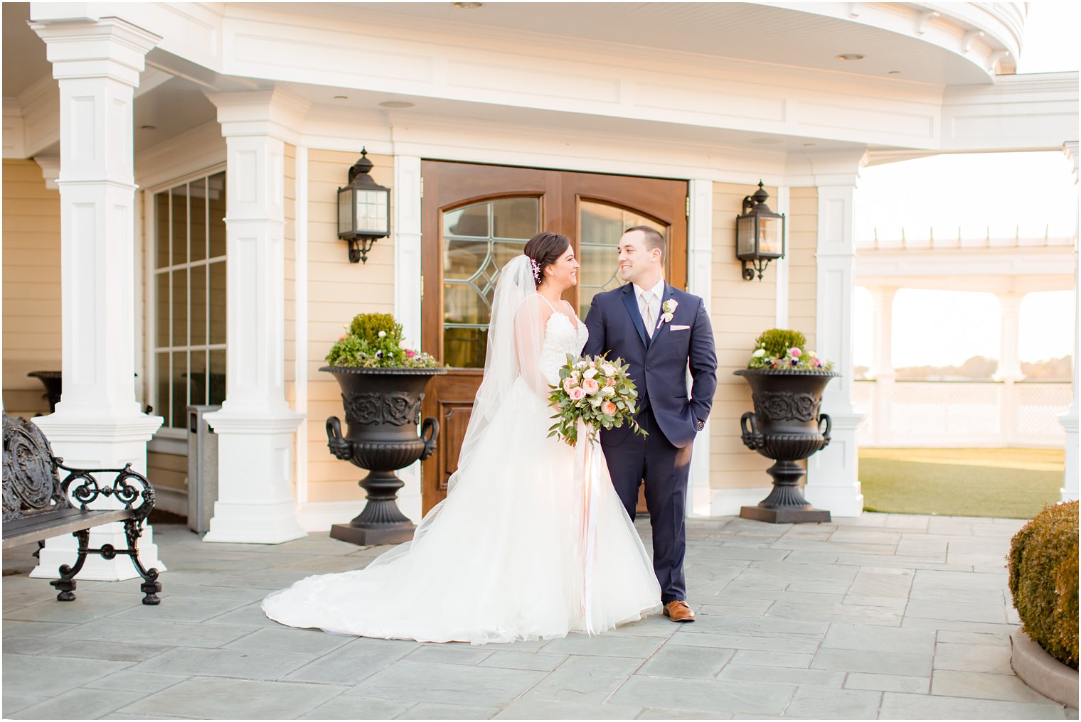 bride and groom posing for photos on wedding day