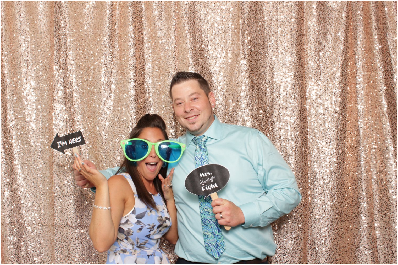 young couple in the photo booth