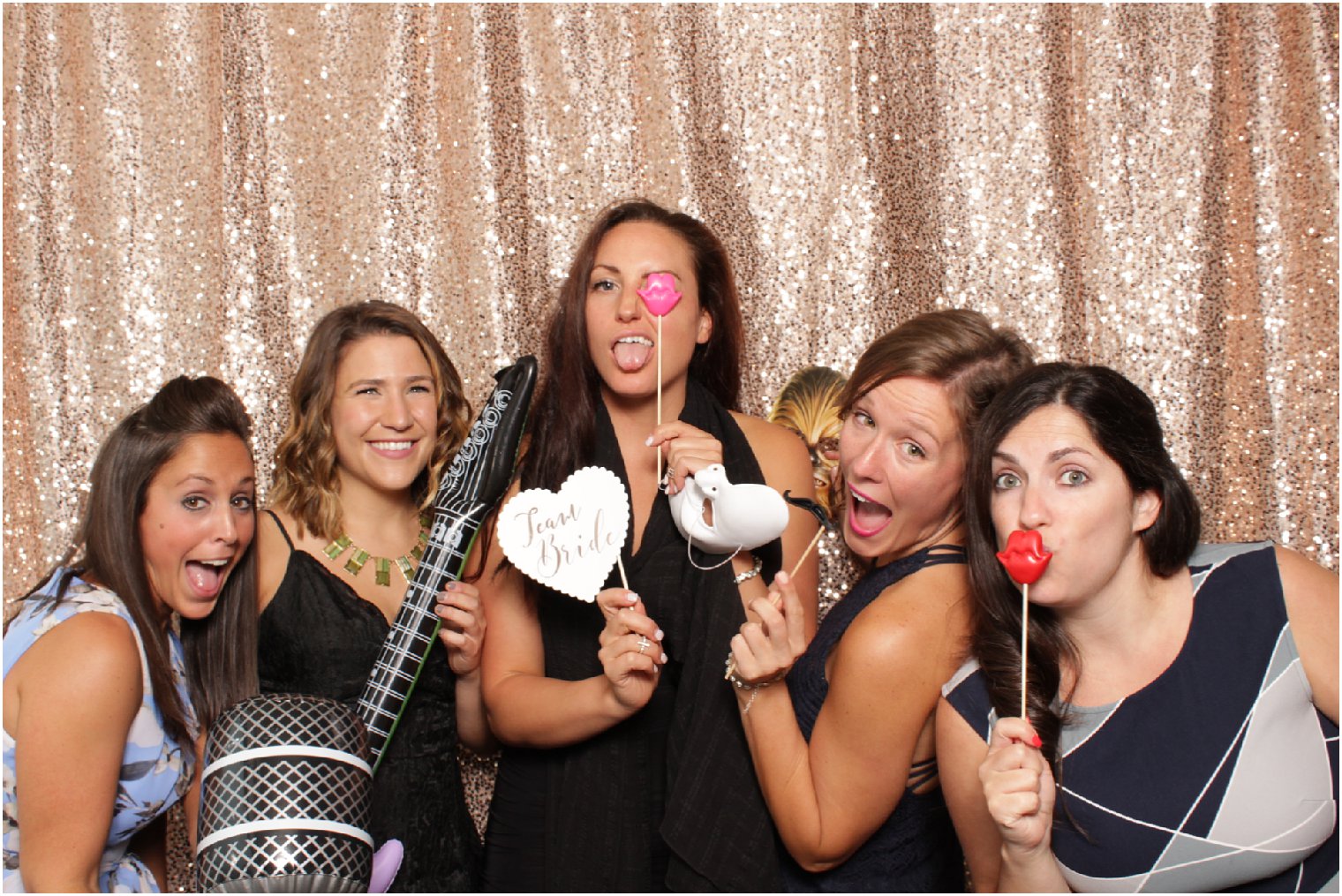 women in the photo booth