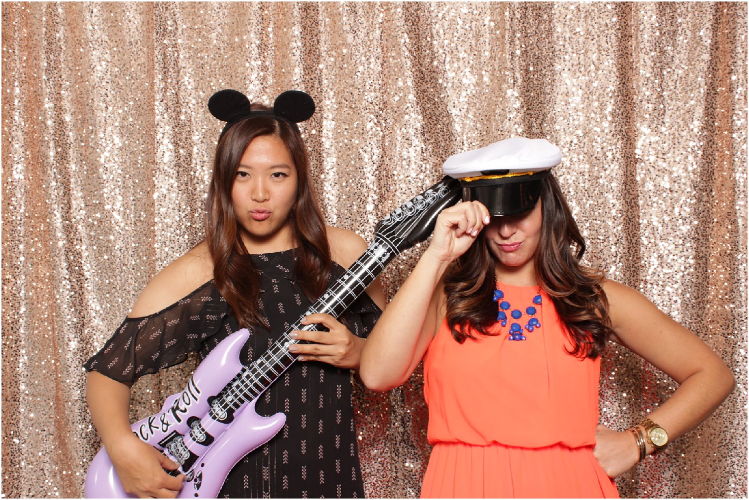 two young women in photo booth